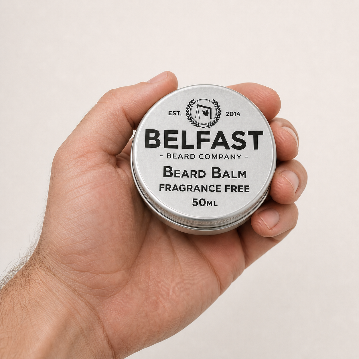 Fragrance-Free Beard Balm 50ml held in a hand to show its size
